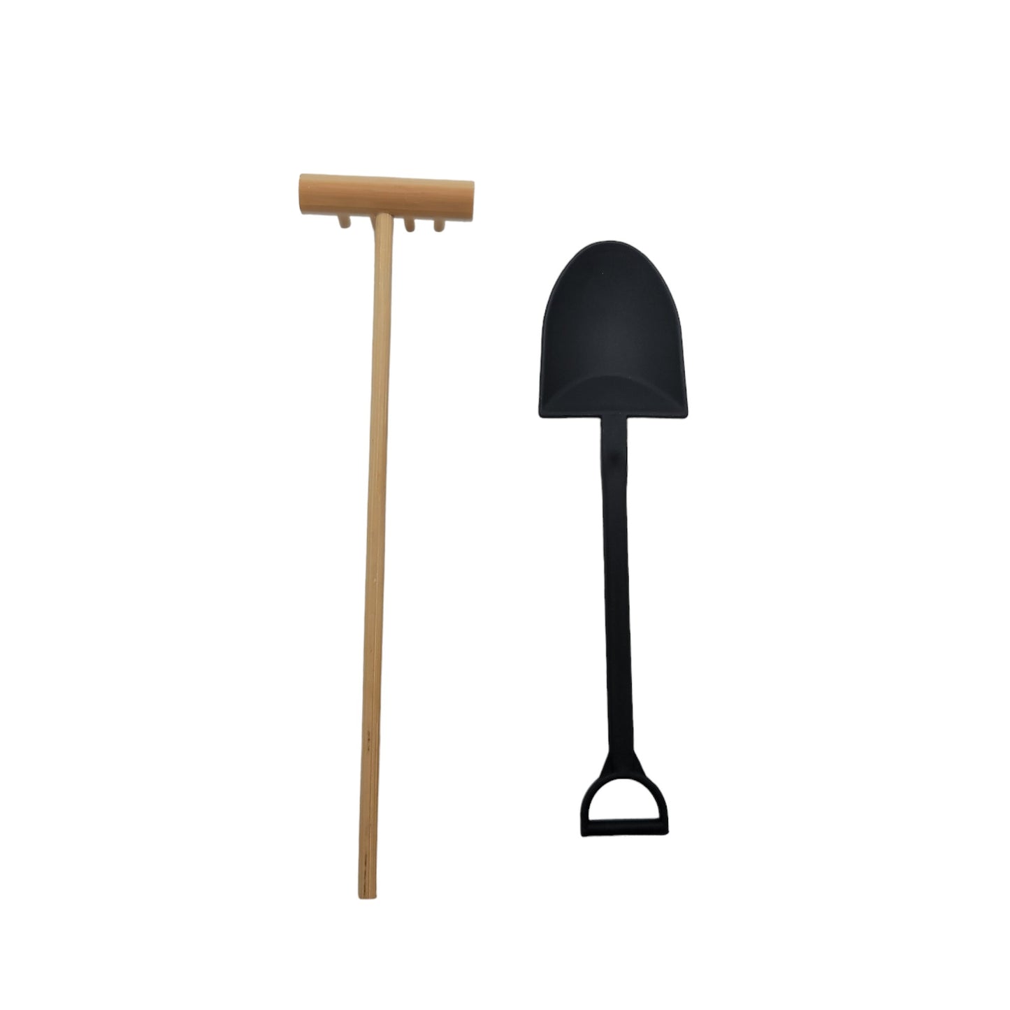 bamboo rake and plastic shovel