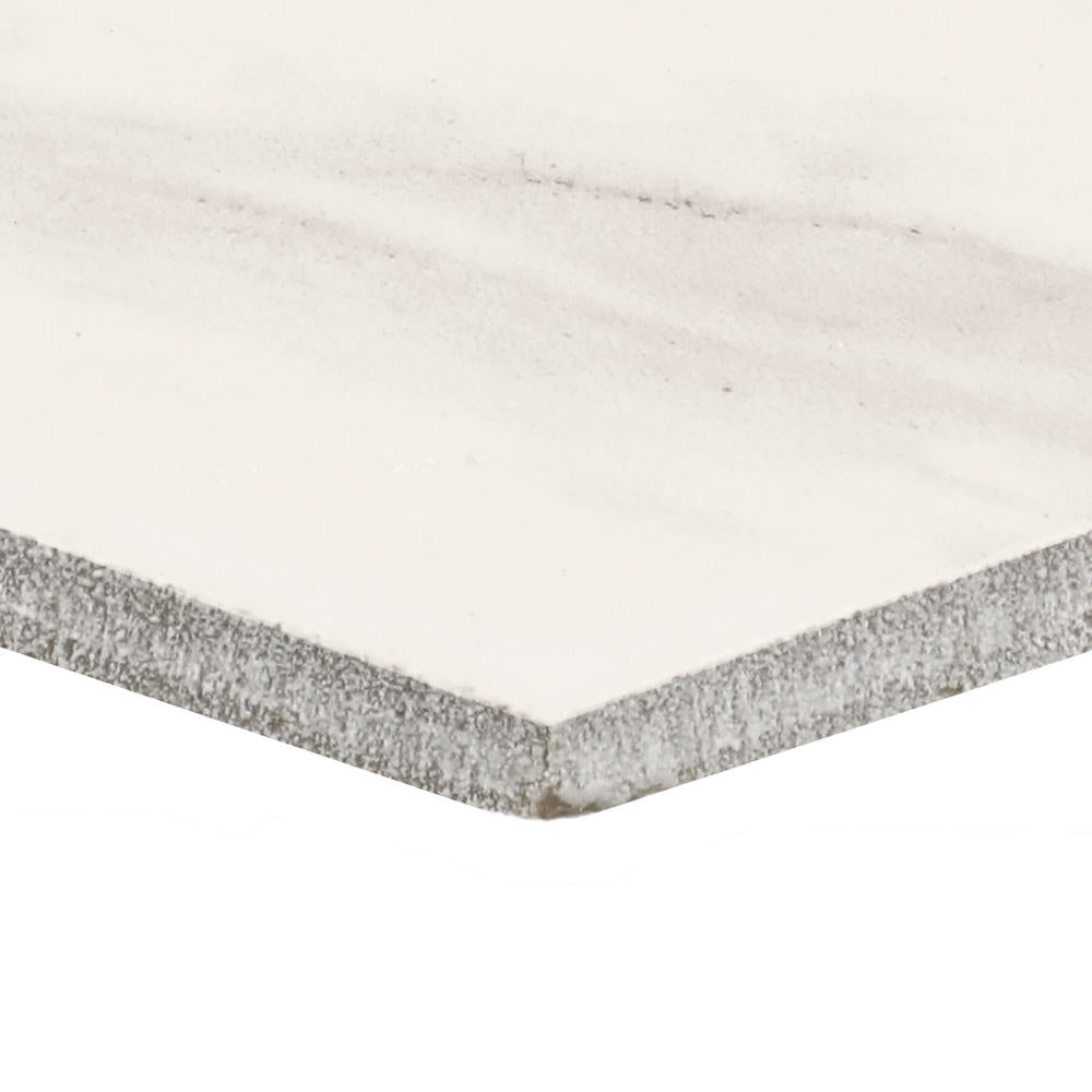Corner of a ceramic tile showing the thickness.